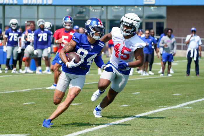 New York Giants WR Jalin Hyatt running away from a defender during training camp in East Rutherford, New Jersey, on July 26, 2023. (Photo by Danielle Parhizkaran of USA Today Sports)